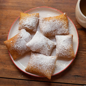 French Market pods arranged in a resealable box, convenient for quick brewing and gifting.