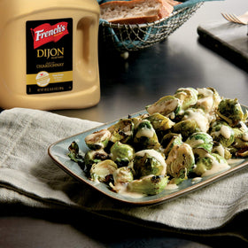 French's Dijon Mustard pretzel dip with tangy, versatile flavor.