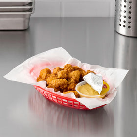 French's Honey Mustard dip cup beside chicken tenders for dipping.