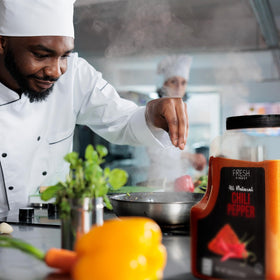 Fresh Finest chili powder rubbed on meat for savory crust