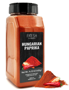 Fresh Finest Hungarian paprika powder in a jar for vibrant color in dishes.