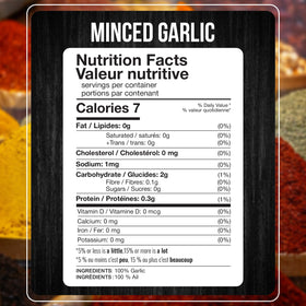 Fresh Finest Minced Garlic raw clove close-up showing texture and fragrant aroma.