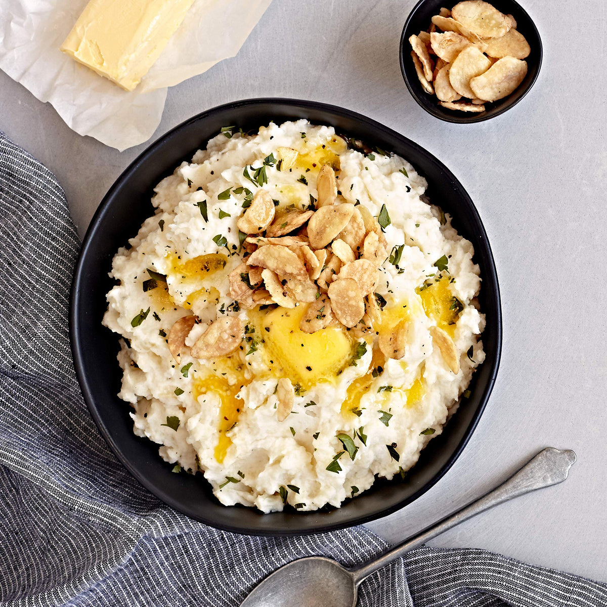 Fresh Gourmet crispy garlic chips in bowl on salad