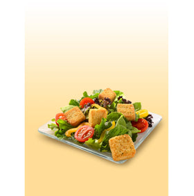 Croutons sprinkled on a fresh salad for extra crunch and texture