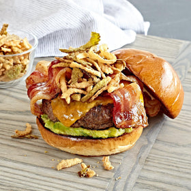 Fresh Gourmet Lightly Salted Crispy Onions in a resealable bag for freshness.