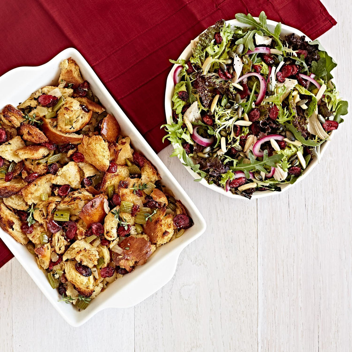 Fresh Gourmet salad-topper mix sprinkled over greens for vibrant texture.