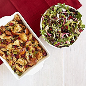 Fresh Gourmet salad-topper mix sprinkled over greens for vibrant texture.