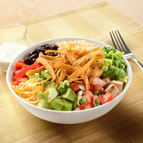 Fresh Gourmet Santa Fe tortilla strips sprinkled over wraps for flavor.