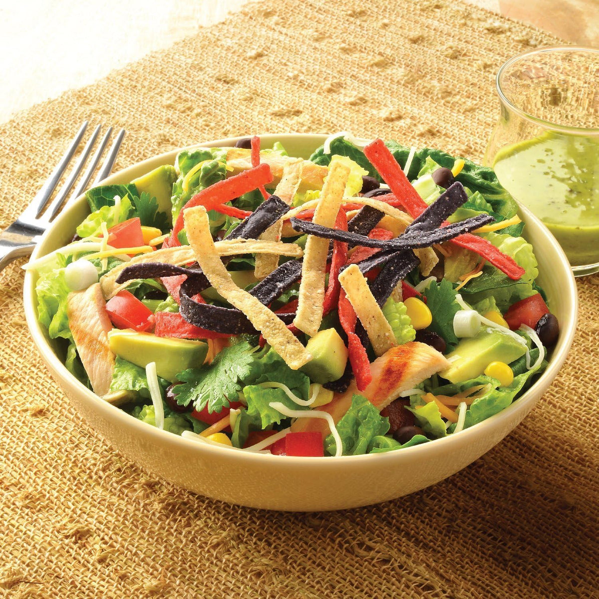 Packaging of Fresh Gourmet Tri-Color Tortilla Strips with reseal feature.