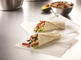 Assorted colors of Fresh Gourmet Tri-Color Tortilla Strips brighten bowls.