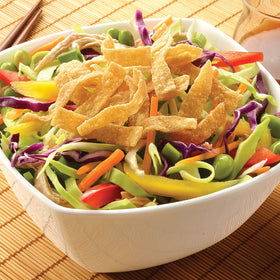 Fresh Gourmet Wonton Strips used as a salad topping for texture