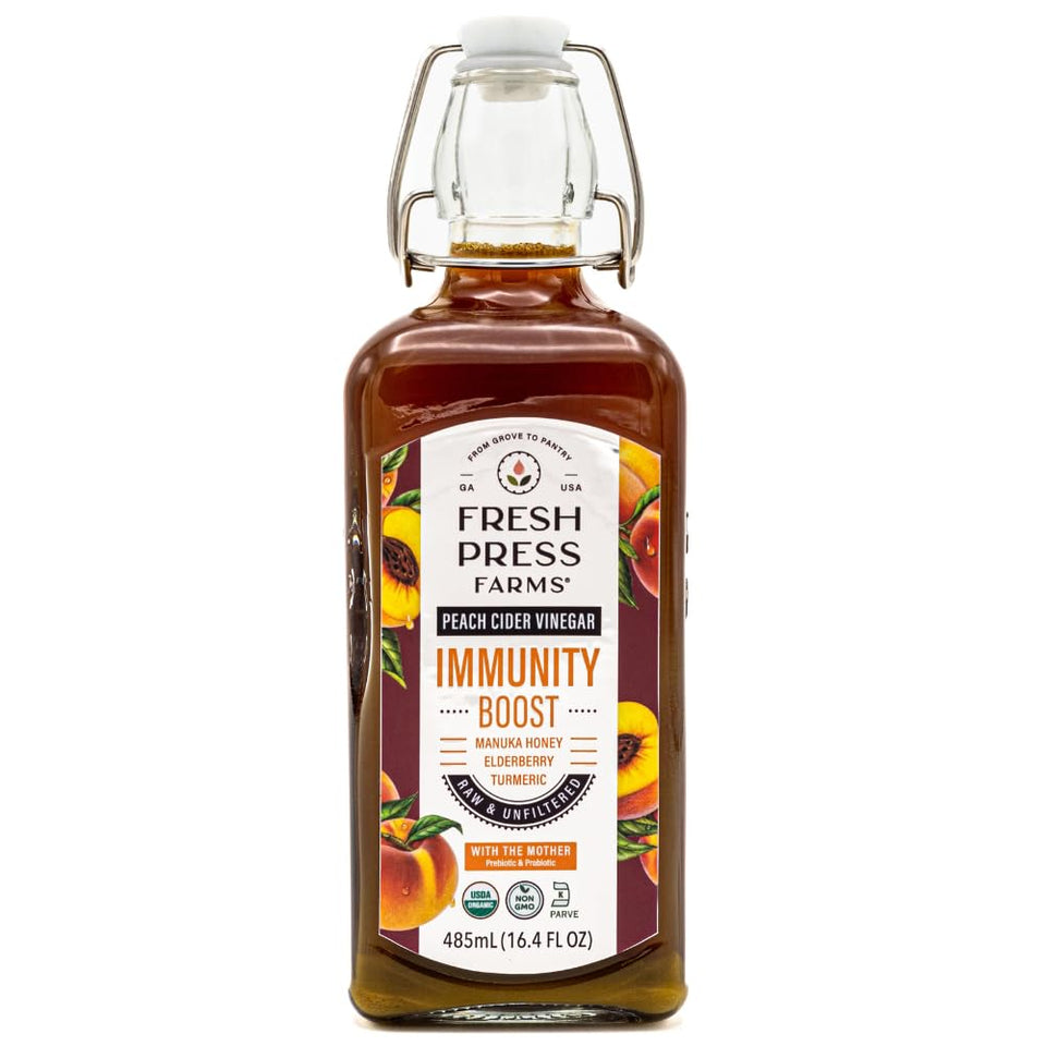 Fresh Press Farms Immunity Boost Peach Cider Vinegar bottle pour for flavorful daily use