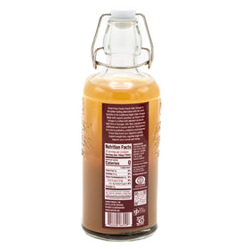 Pourable peach cider vinegar for easy dilution in beverages.
