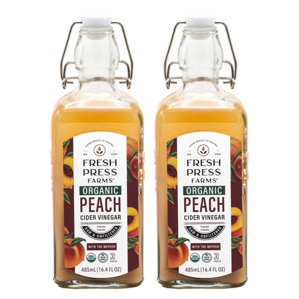 Fresh Press Farms peach cider vinegar bottle for daily dressings.