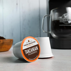 Fresh Roasted Coffee African Variety Pack solar array highlights greener production.