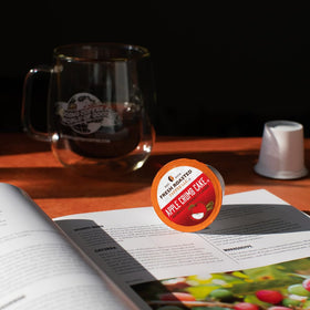 Steaming cup reveals cinnamon spice and apple sweetness.