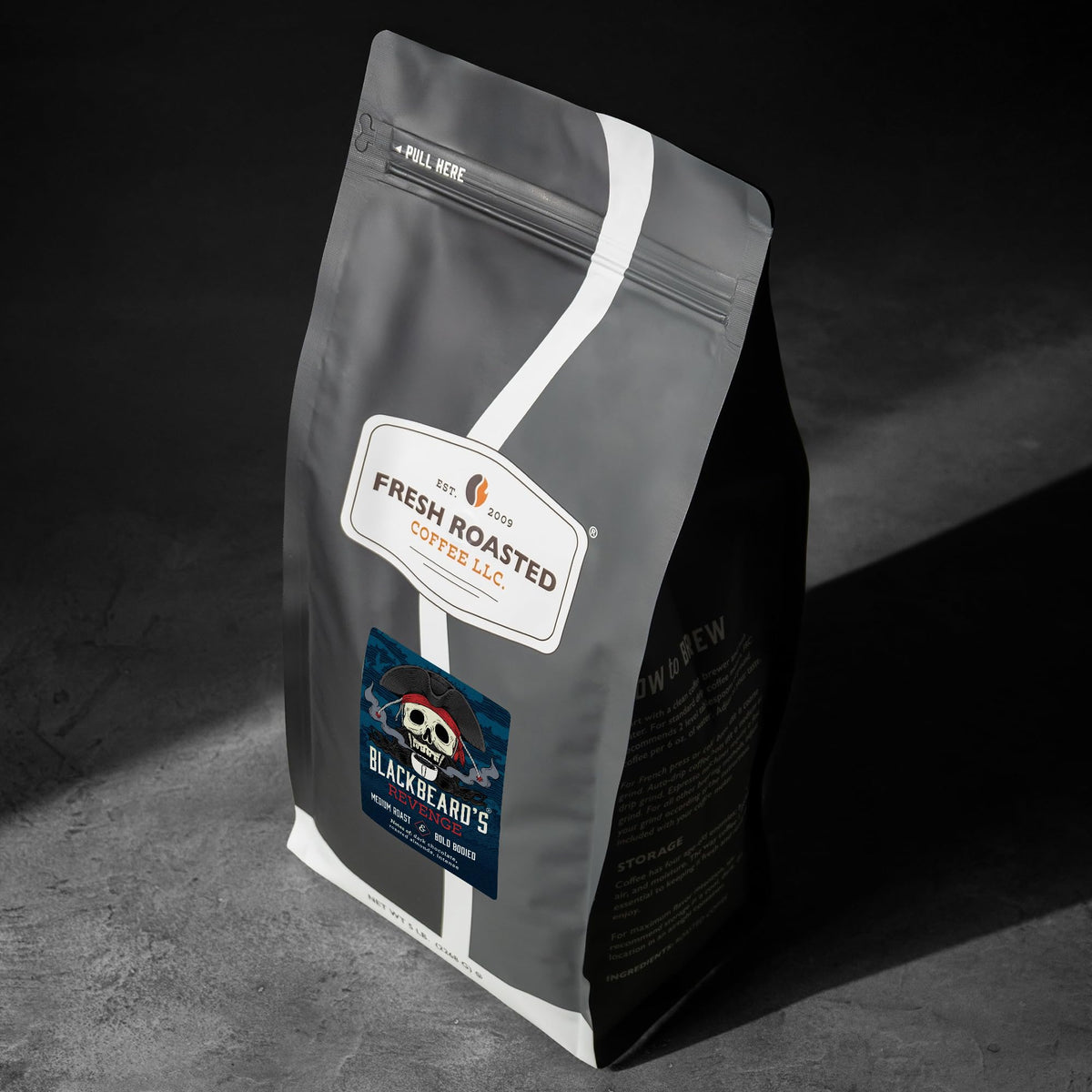 Fresh Roasted Coffee Blackbeard's Revenge coffee beans close-up, rich notes.