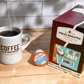 Fresh Roasted Coffee coconut-flavored pods close-up reveals aromatic coconut notes.
