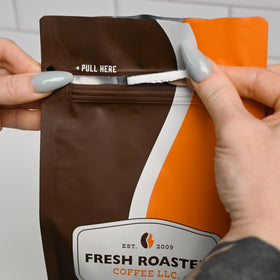 Fresh Roasted Coffee Colombian Water Half-Caf cup delivers smooth finish