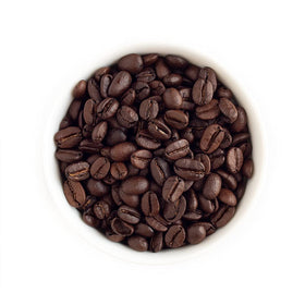 Fresh Roasted Coffee dark Mexican beans close-up highlighting rich color.