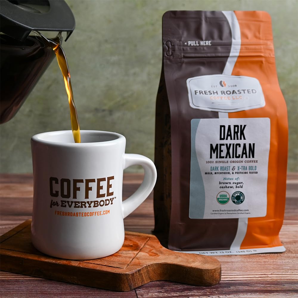 Fresh Roasted Coffee dark Mexican dark roast beans closeup signals an intense brew.