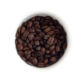 Fresh Roasted Coffee dark Sumatra Mandheling ground close-up showing aroma oils