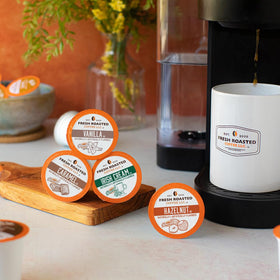 Fresh Roasted Coffee caramel flavor pod close-up, ideal late-day treat.