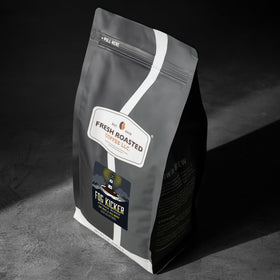 Fog Kicker roaster in an eco-friendly setup emphasizing sustainable roasting.