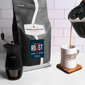 Fresh Roasted Coffee French Roast bag open with sturdy packaging