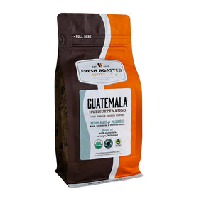 Fresh Roasted Coffee Guatemala bag shows organic single-origin packaging for at-home brewing.
