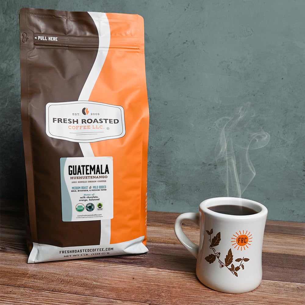Fresh Roasted Coffee Guatemala Huehuetenango grounds for aroma-rich brewing.