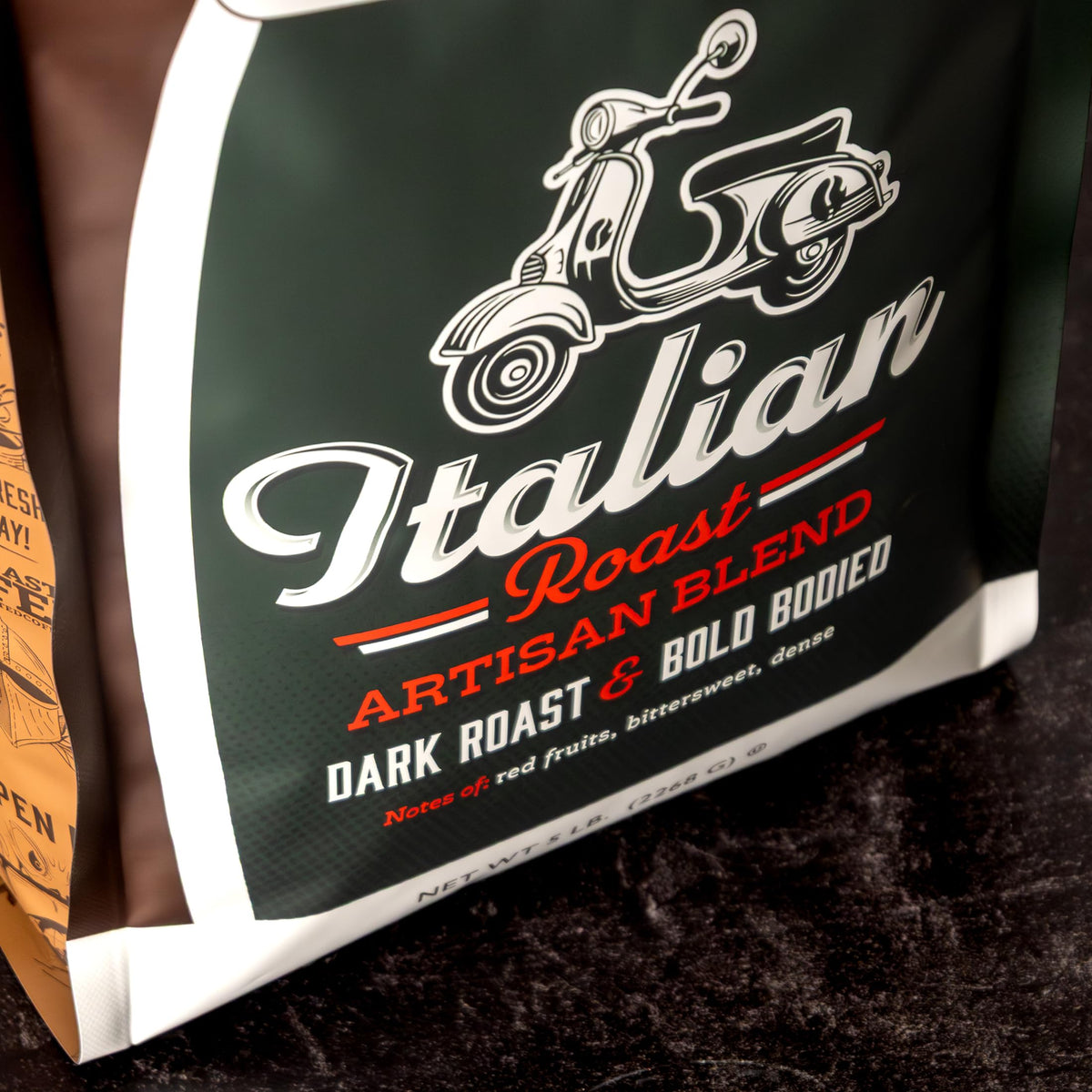 Fresh Roasted Coffee Italian Roast coffee being poured, showcasing bold flavor.