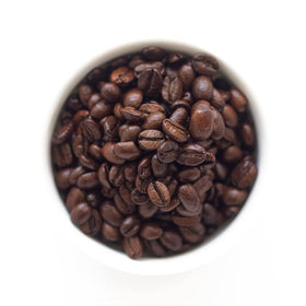 Fresh Roasted Coffee Jamaican Me Crazy close-up highlighting caramel and vanilla notes.