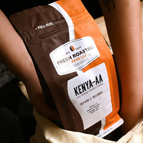 Fresh Roasted Coffee Kenya AA OU Kosher seal signals trusted certification.