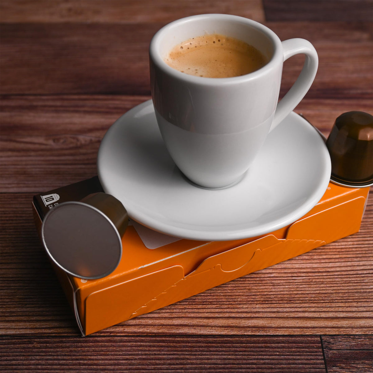 Fresh Roasted Coffee capsule pack in kitchen ready for daily brew.