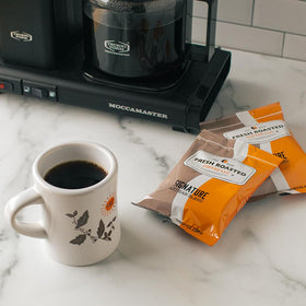 Fresh Roasted Coffee with Loring roaster technology highlighting eco-friendly roasting