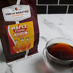 Fresh Roasted Coffee Maple Crème ground coffee, convenient for quick brews.