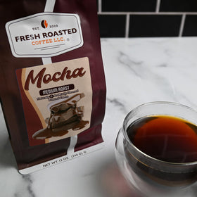 Fresh Roasted Coffee espresso pour reveals rich mocha notes and full body.