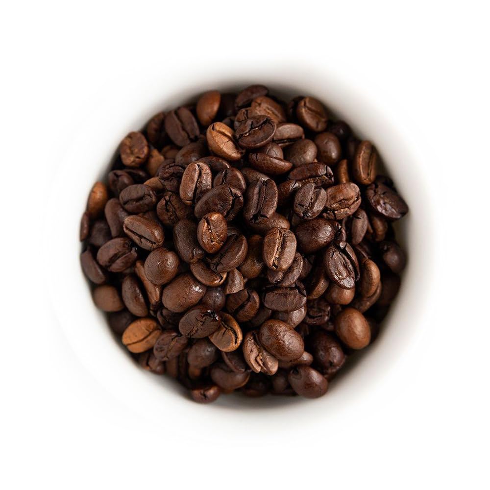 Fresh Roasted Coffee monsoon-malabar beans close-up showing smooth, creamy mouthfeel potential.
