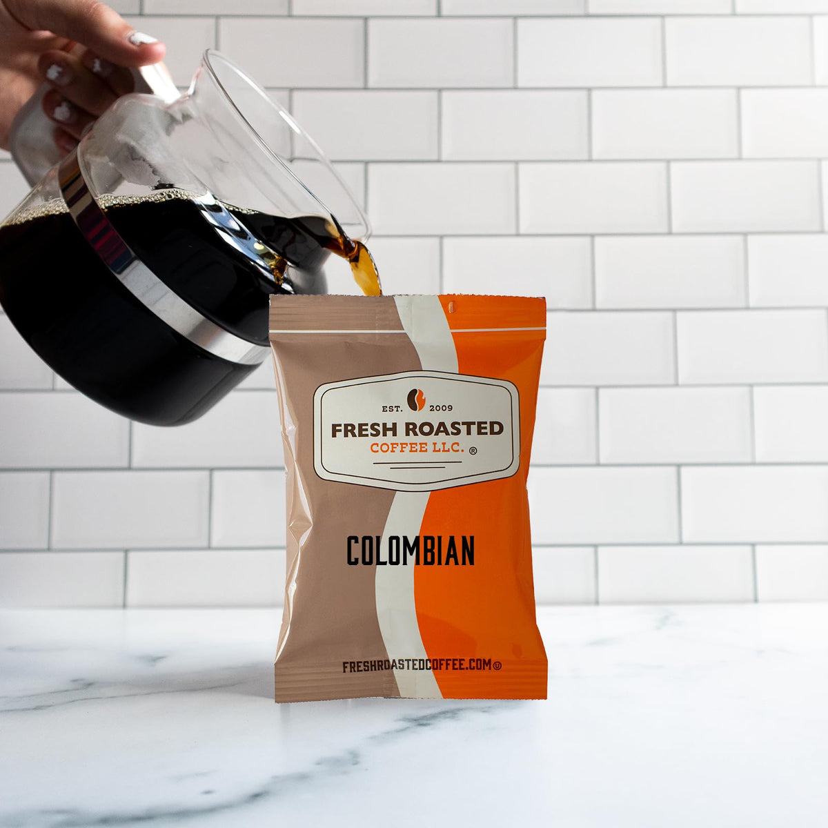 Fresh Roasted Coffee office desk display showing convenient single-serve packets.