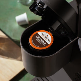 Organic Colombian Typica and Castillo beans in pods with chocolate and almond notes.