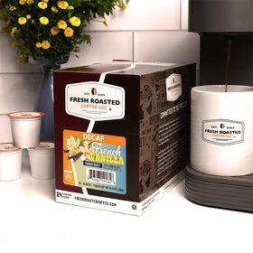 Fresh Roasted Coffee recyclable cup and foil lid emphasize eco-conscious packaging.