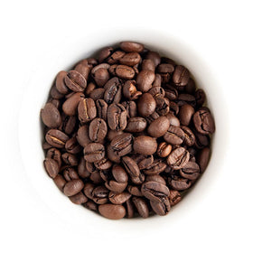 Fresh Roasted Coffee facility with solar array supports cleaner roasting energy.