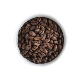 Fresh Roasted Coffee Sumatra Mandheling beans close-up highlighting glossy aroma potential.
