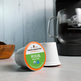 Fresh Roasted Coffee Swiss Water half-caf processed note emphasizing mild caffeine.