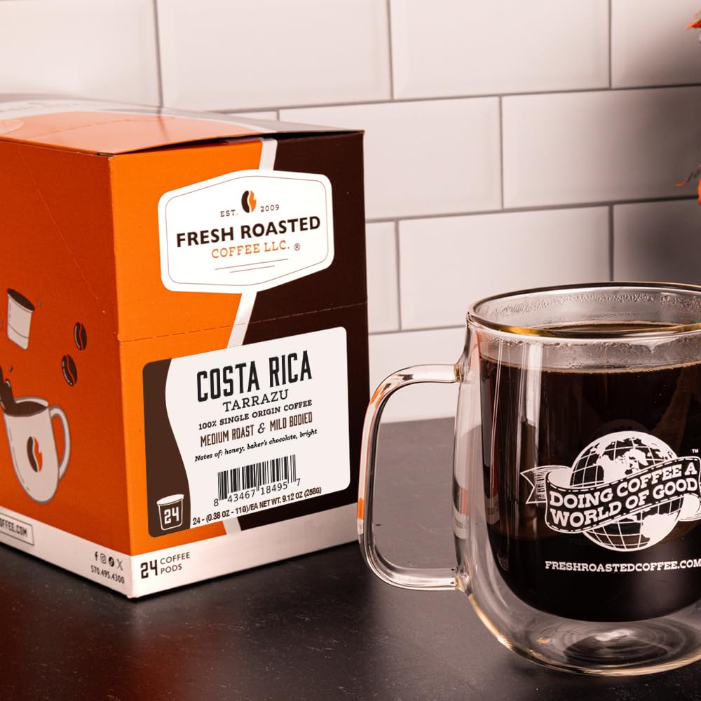 Fresh Roasted Coffee Tarrazu pod close-up shows sturdy lid and compact design.
