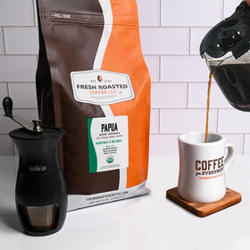 Fresh Roasted Coffee whole beans in airtight jar signaling extended freshness.