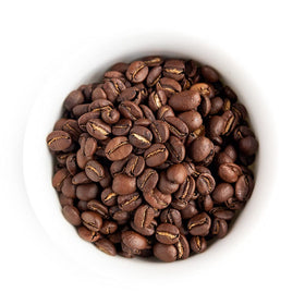 Fresh Roasted Coffee Yirgacheffe beans close-up with glossy, vibrant appearance.