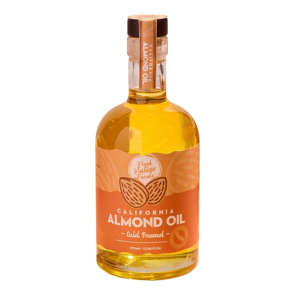 Fresh Vintage Farms almond oil bottle pour showing a smooth finish for everyday cooking
