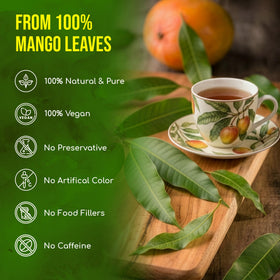 FreshDrinkUS mango leaves tea dried leaves spread emphasizes sun-dried flavor and aroma.